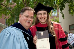 Myself with my advisor James Hankins and our co-authored book, at my Harvard Ph.D. graduation.